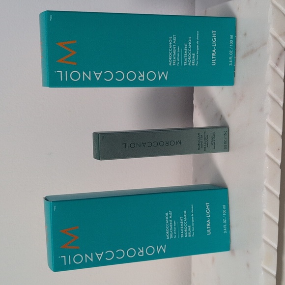 Moroccanoil Other - Two Moroccanoil Ultra-Light Treatment Mist in Teal With Lip Balm